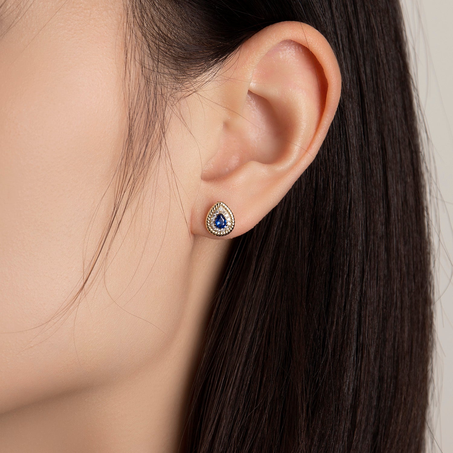 Dissoo® Gold Pear Blue Halo Twisted Frame Stud Earring