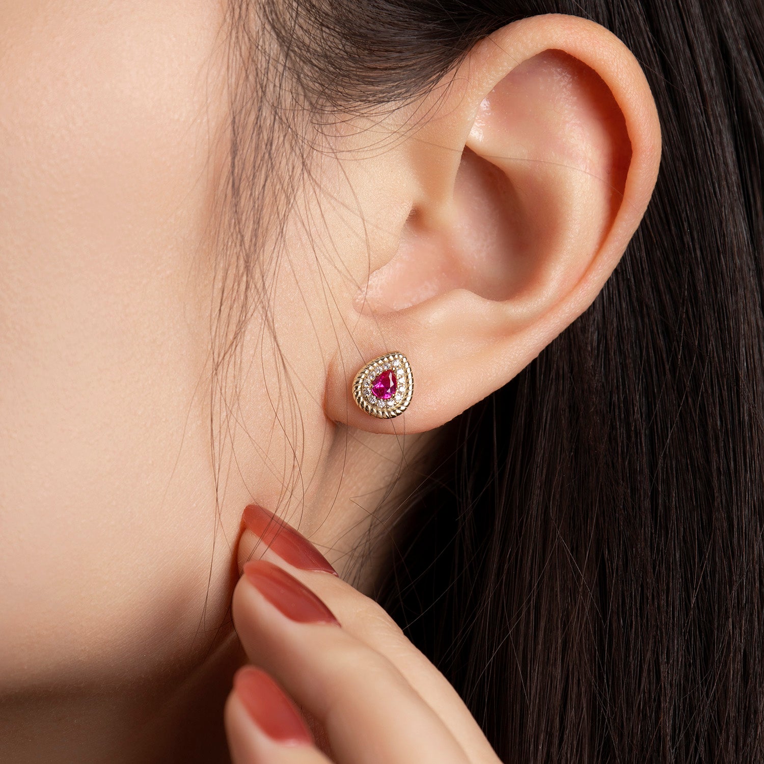 Dissoo® Gold Pear Ruby Halo Twisted Frame Stud Earring