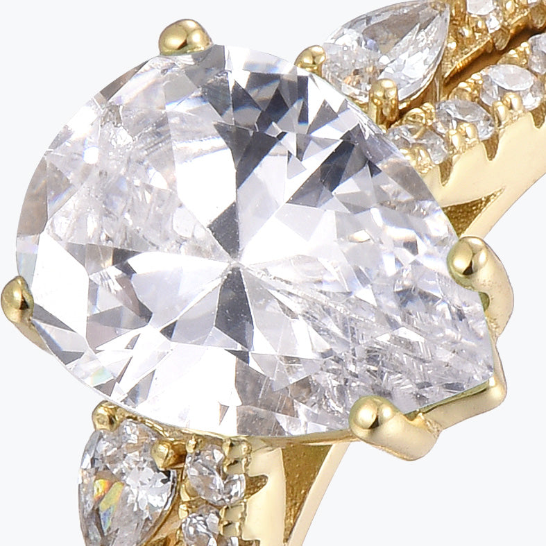 Dissoo® Gold Pear Moissanite Eternity Engagement Ring and Open-shank Wedding Ring