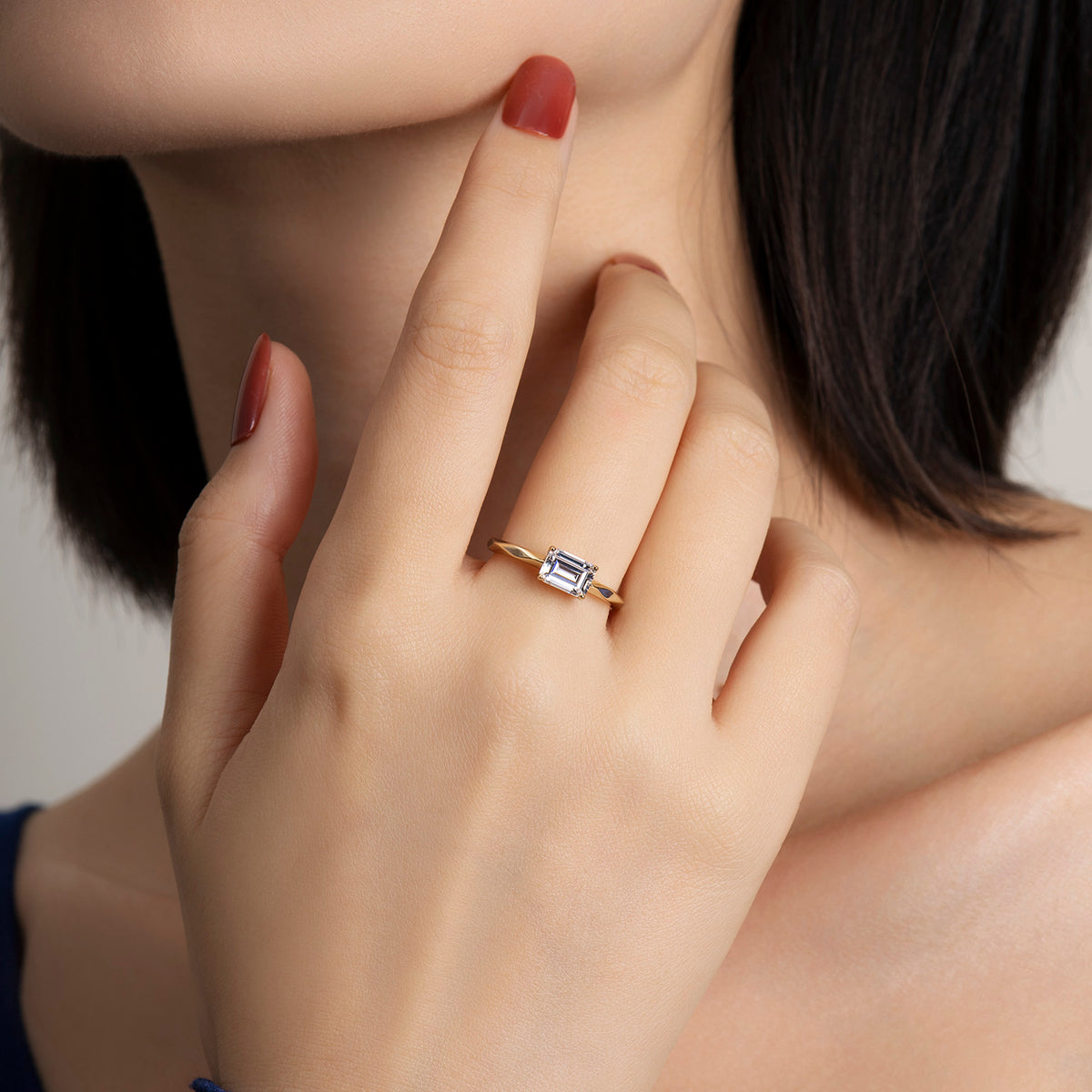 Dissoo® 0.60 ct Emerald Cut Moissanite Engagement Ring in Gold Vermeil