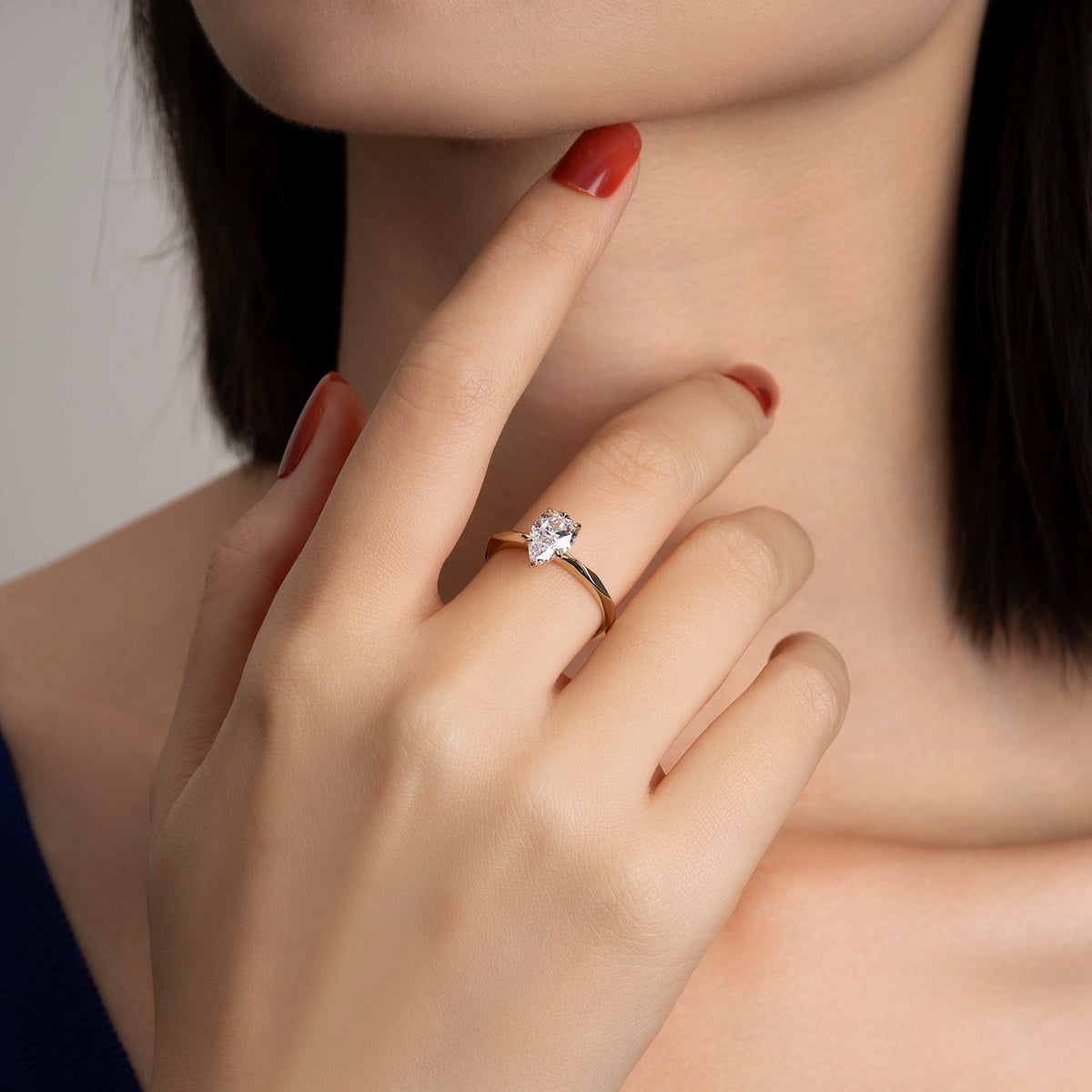 Dissoo® Yellow Gold Pear Multi-faceted Moissanite Engagement Ring