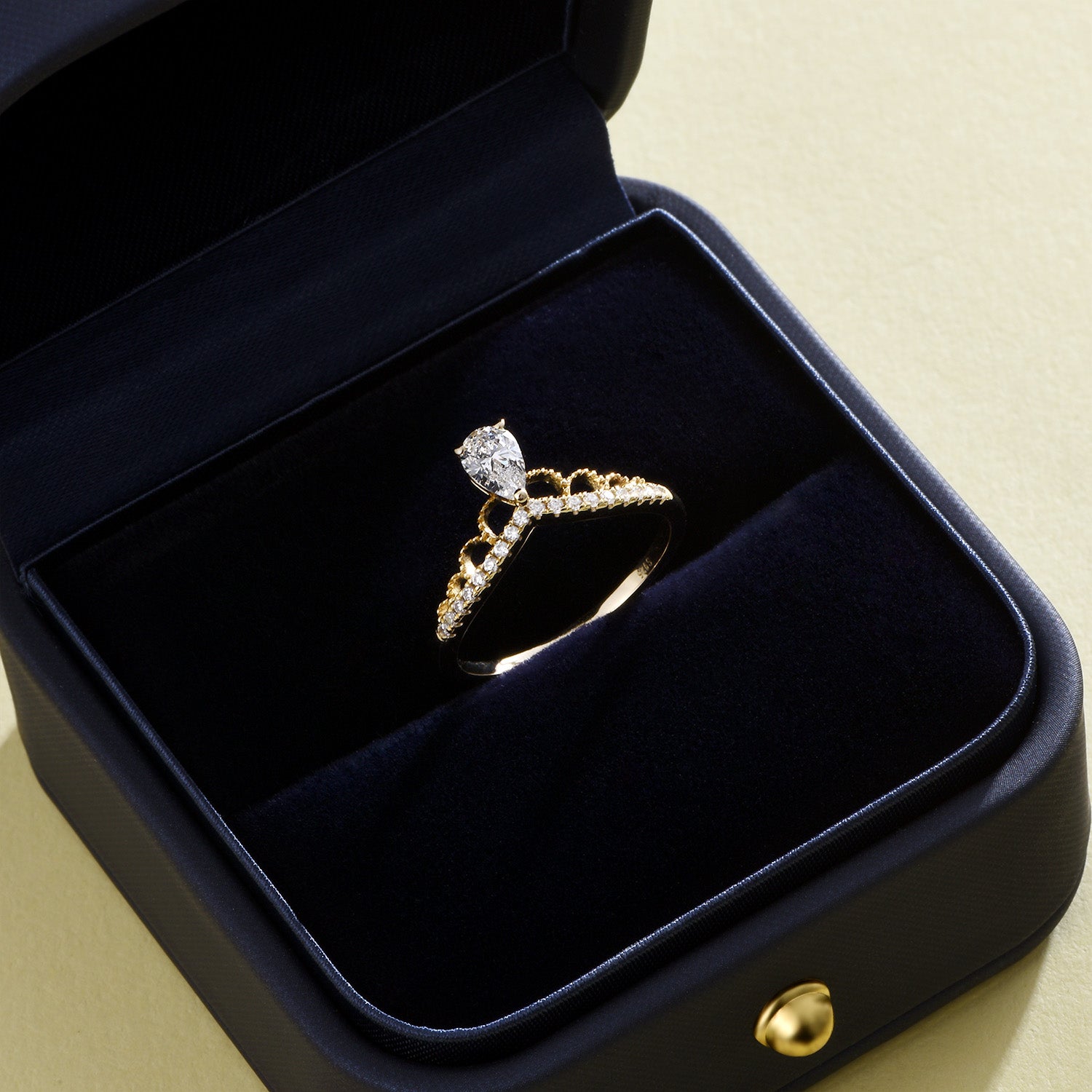 Dissoo® Pear Crown Design Moissanite Engagement Ring in Gold Vermeil