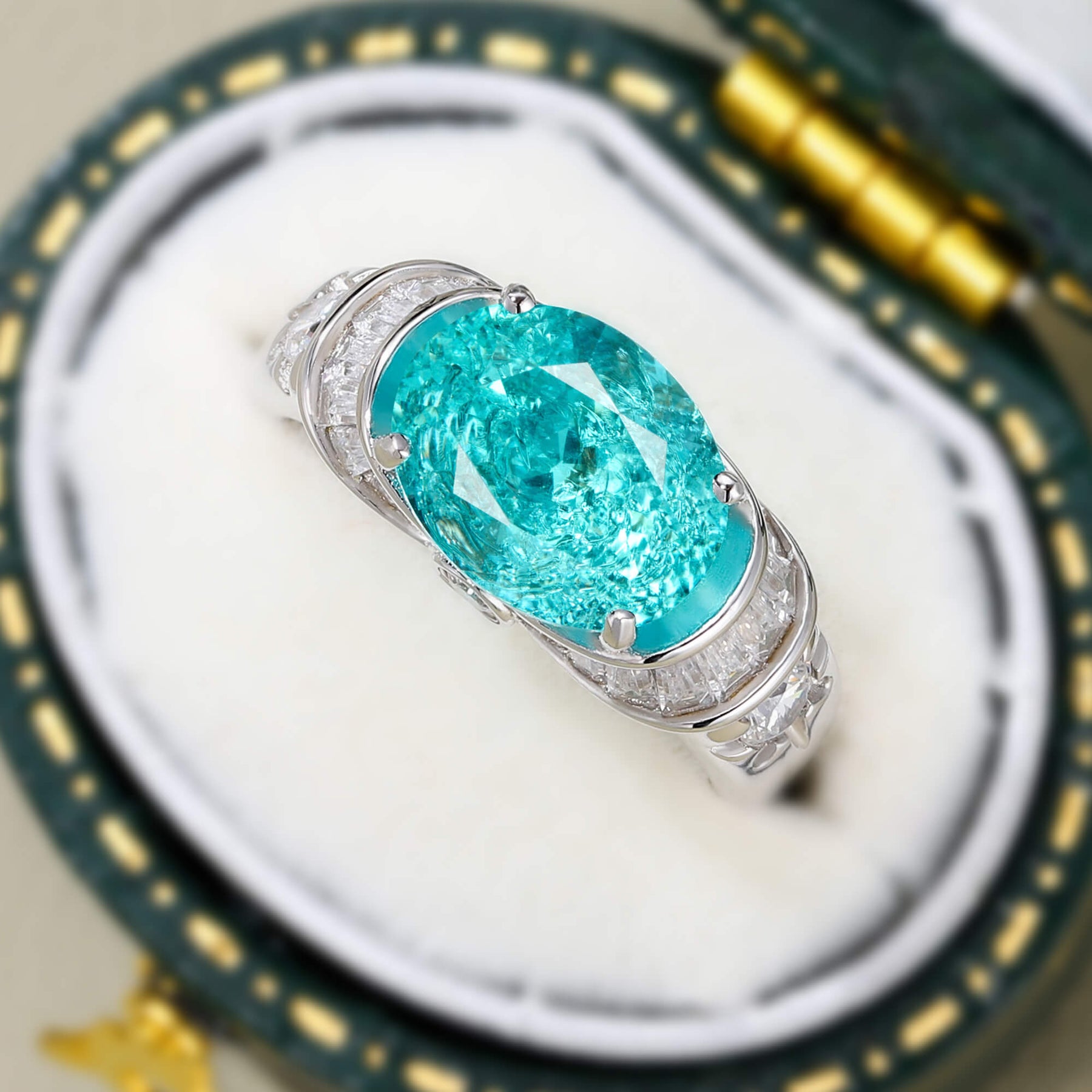 The Esmeralda Oval Cut Lab Grown Paraiba Garnets Ice-crackle Texture Ring