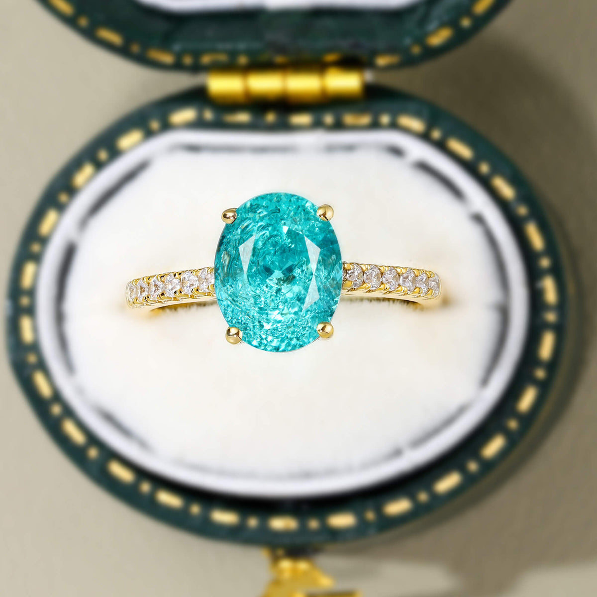 The Opaline Oval Cut Lab Grown Paraiba Garnets Ice-crackle Texture Ring
