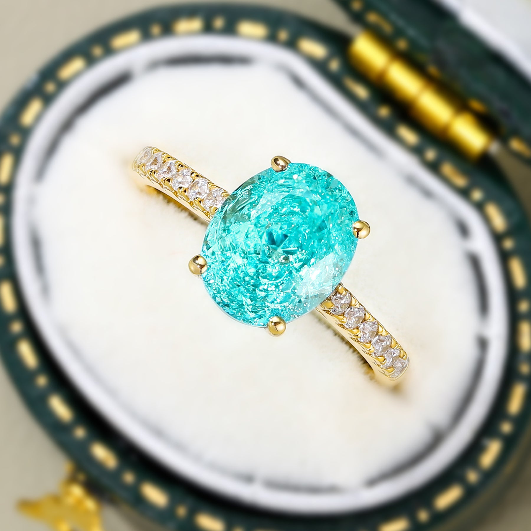 The Opaline Oval Cut Lab Grown Paraiba Garnets Ring