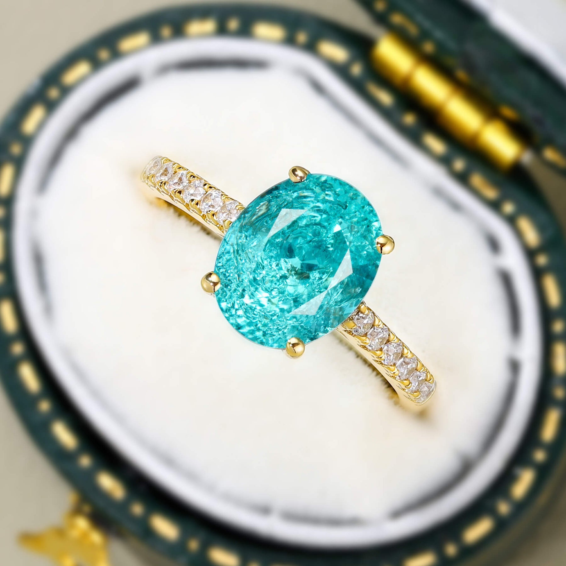 The Opaline Oval Cut Lab Grown Paraiba Garnets Ice-crackle Texture Ring