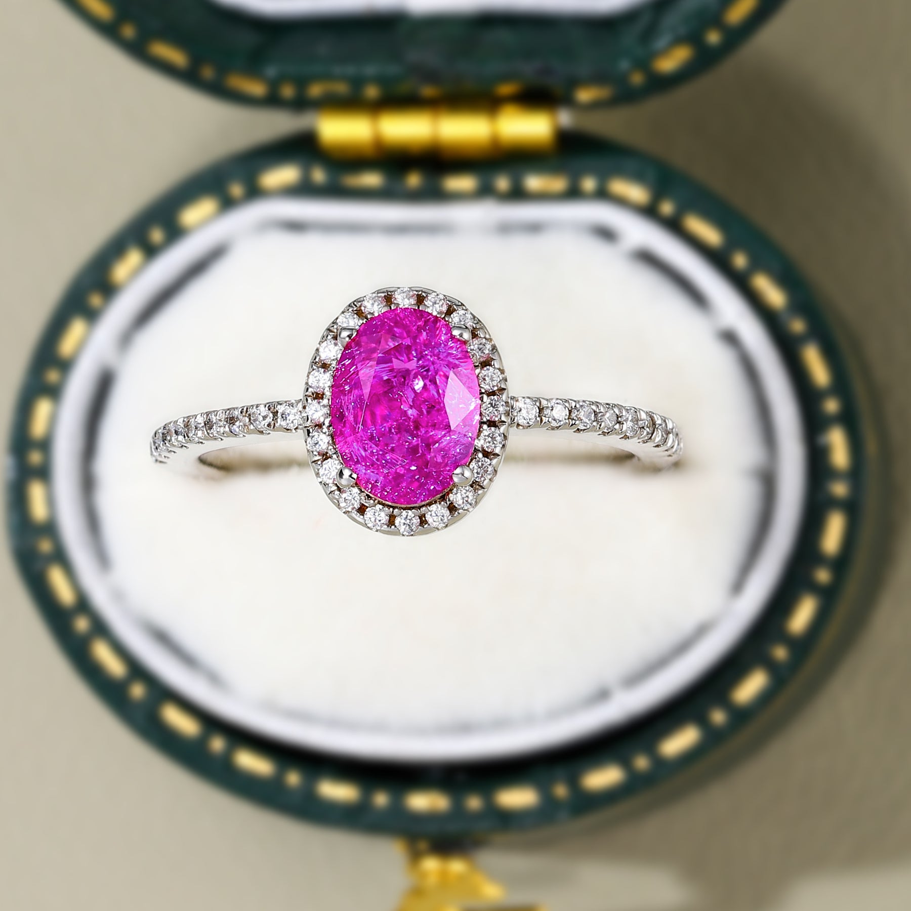 The Odette Oval Cut Lab Grown Rose Sapphire Halo Ring