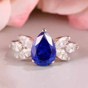The Luna Pear Cut Lab Grown Royal Blue Sapphire Ice-crackle Texture Ring