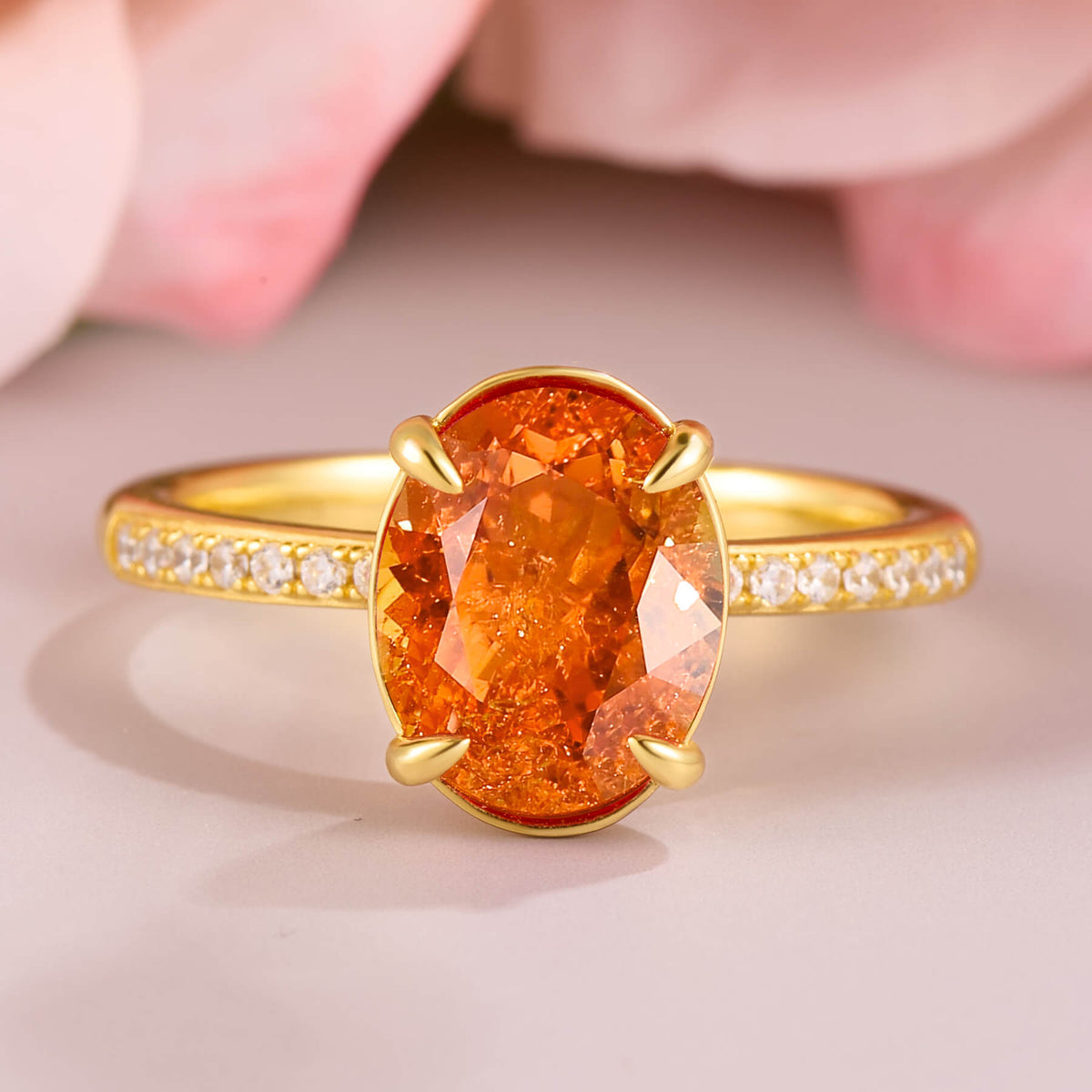 The Luna Oval Cut Lab Grown Fanta Garnets Ice-crackle Texture Ring