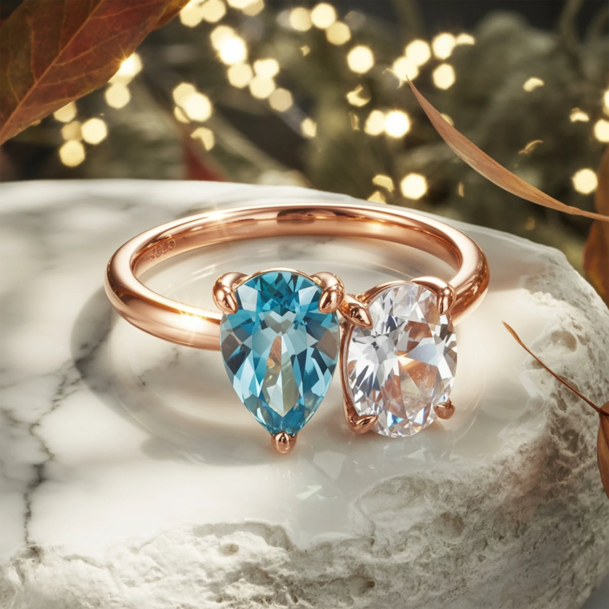 The Celestria 1CT Pear Cut Blue Moissanite & 1CT Oval Cut Moissanite Ring