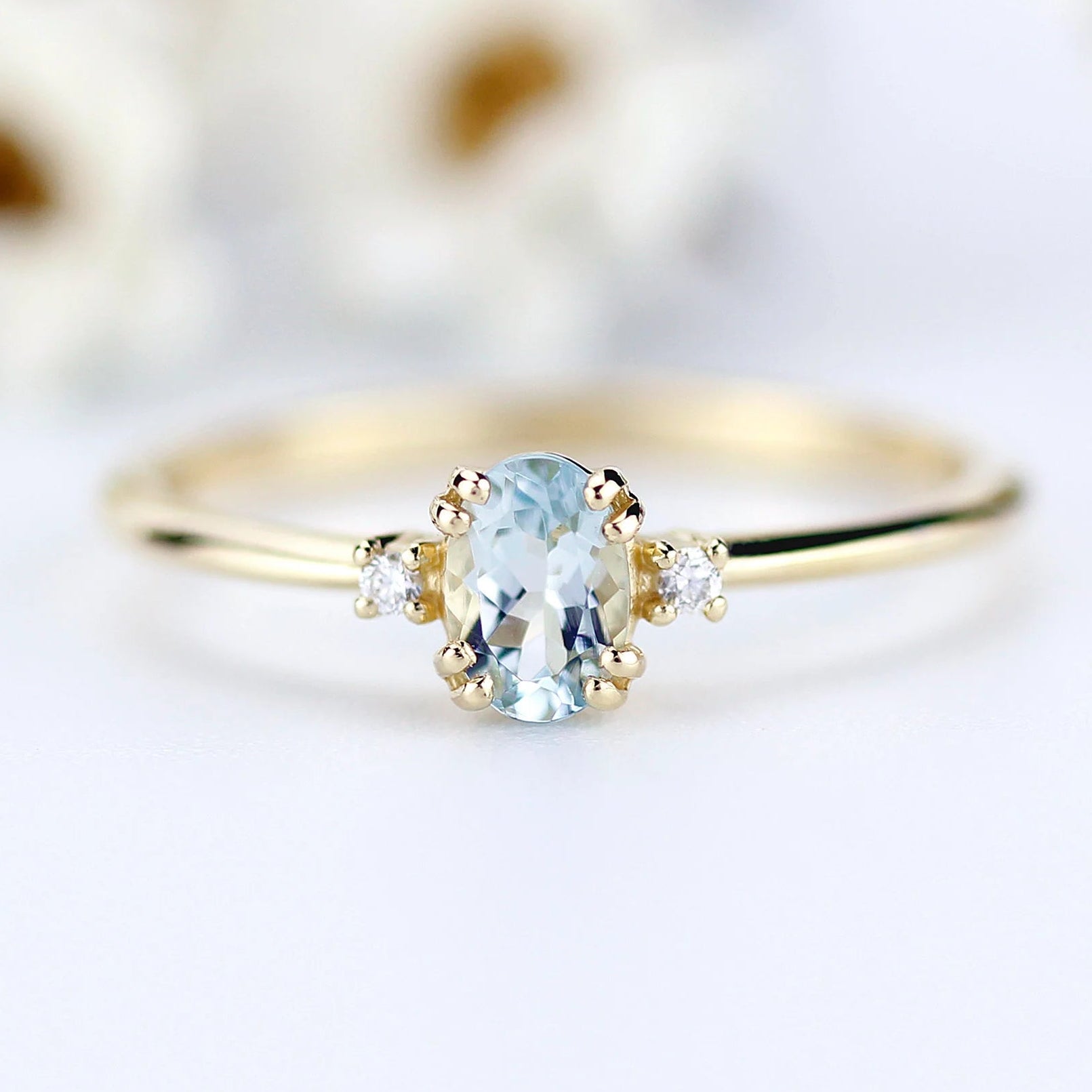 Valoria Oval Cut Lab Grown Aquamarine Three-Stone Engagement Ring