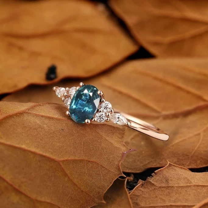 Nature Inspired Oval Cut Green Gemstone Cluster Engagement Ring