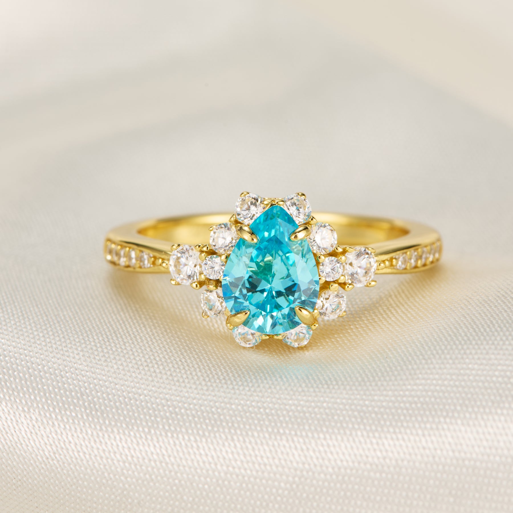 The Bethany Pear Cut Blue Gemstone Halo Ring