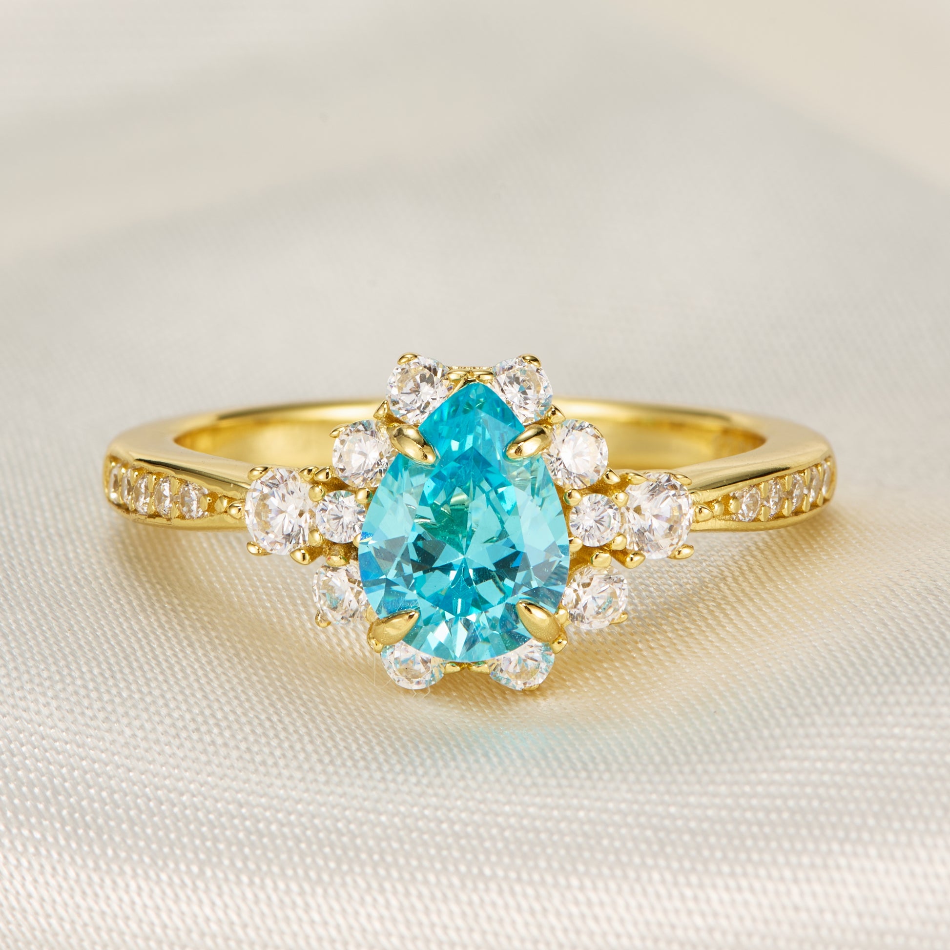 The Bethany Pear Cut Blue Gemstone Halo Ring