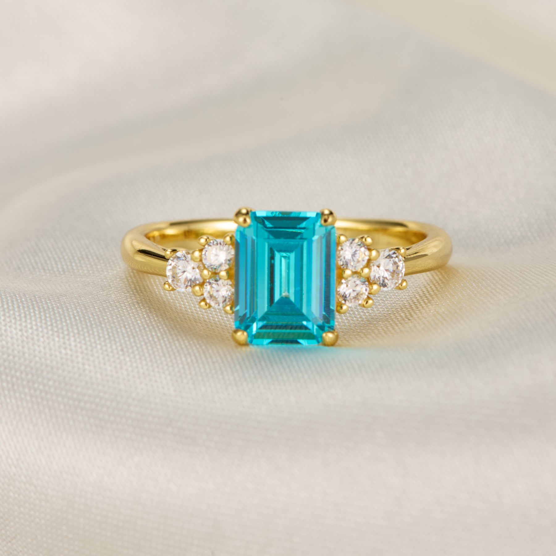 Carina Emerald Cut Topaz Engagement Ring