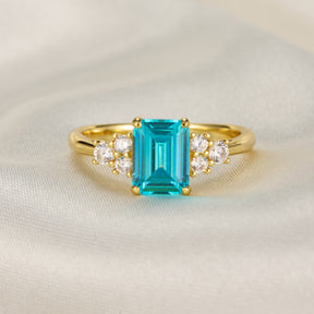 Carina Emerald Cut Topaz Engagement Ring