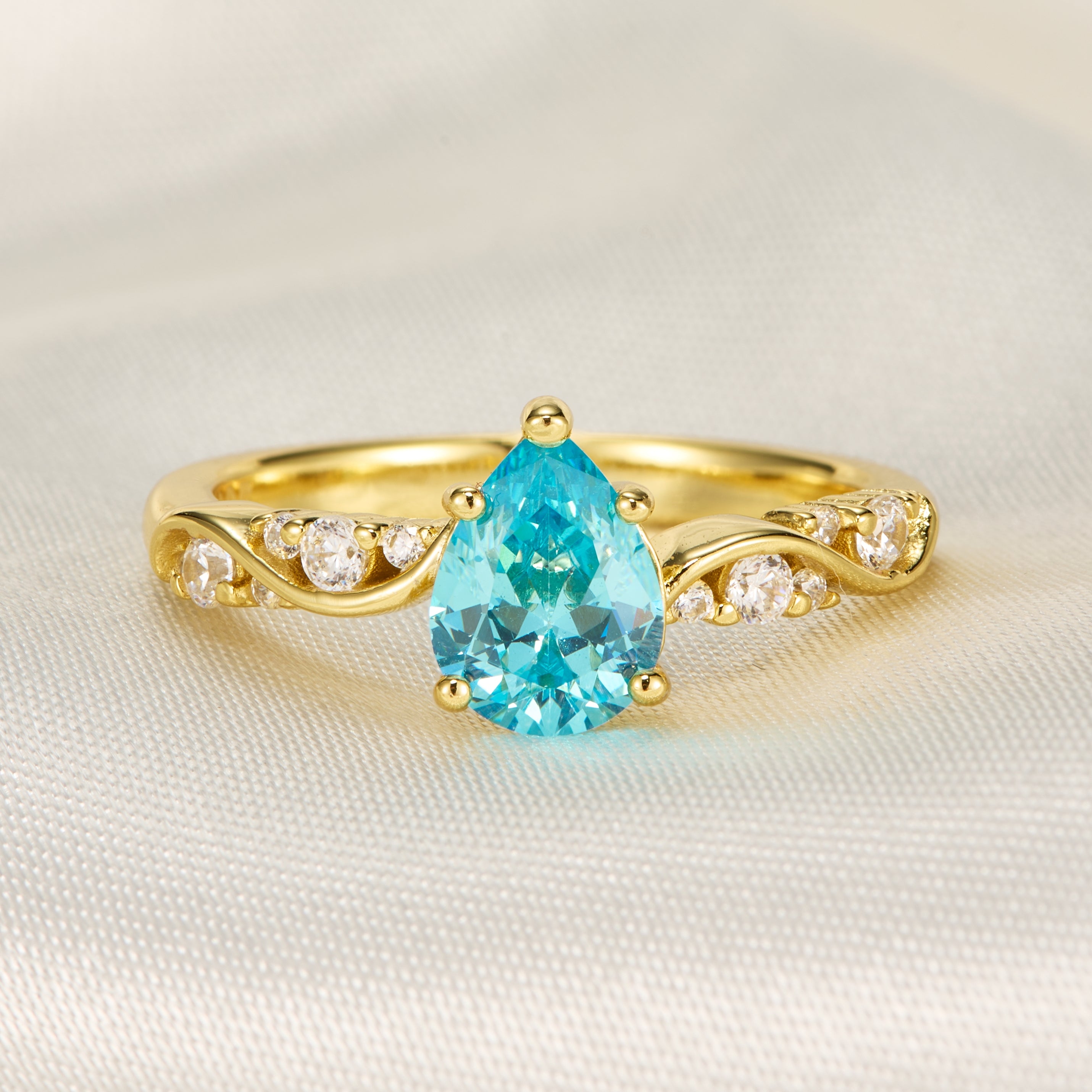 The Rosetta Pear Cut Blue Gemstone Engagement Ring