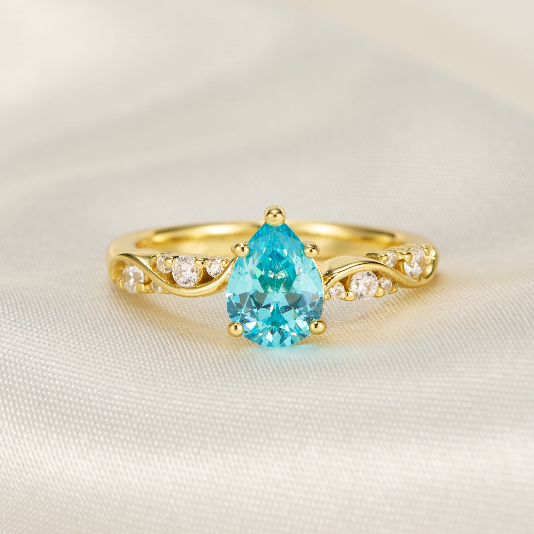 The Rosetta Pear Cut Blue Gemstone Engagement Ring