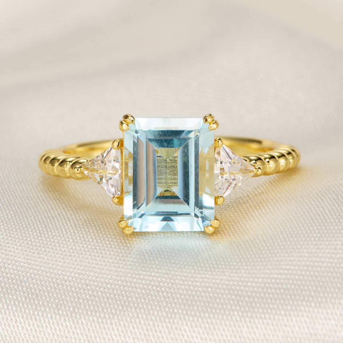The Elowyn Emerald Cut Topaz Engagement Ring