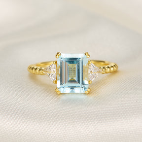 The Elowyn Emerald Cut Topaz Engagement Ring