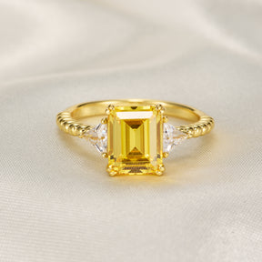 The Elowyn Emerald Cut Lab-Grown Yellow Sapphire Engagement Ring