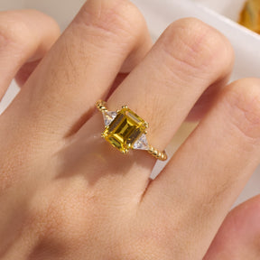 The Elowyn Emerald Cut Lab-Grown Yellow Sapphire Engagement Ring