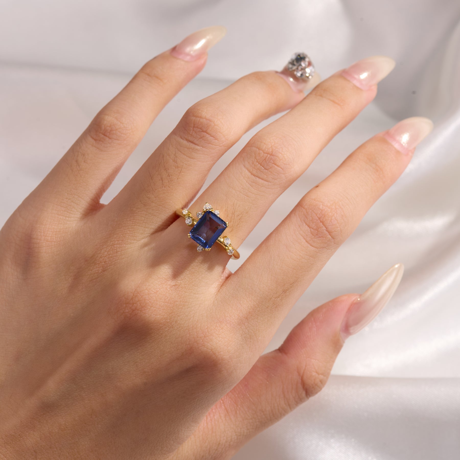 Emerald Cut Lab Grown Sapphire Engagement Ring