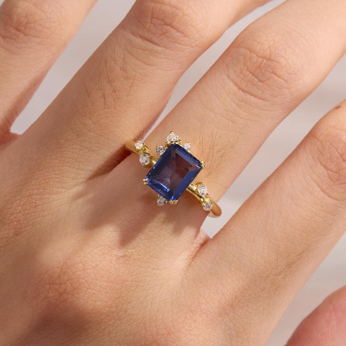 Emerald Cut Lab Grown Sapphire Engagement Ring