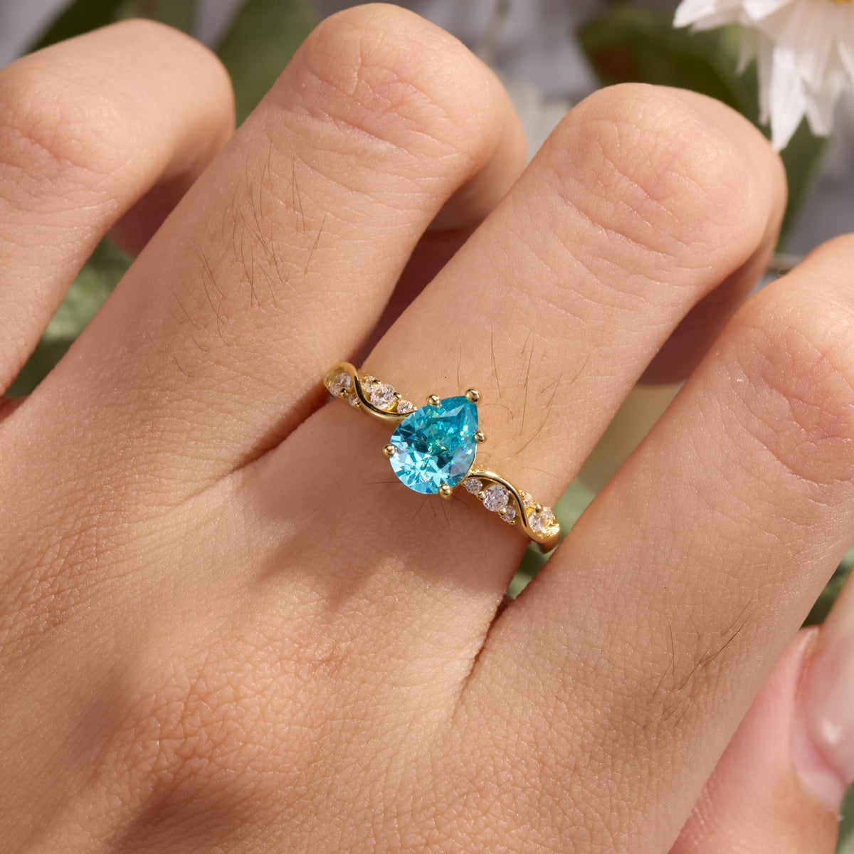 The Rosetta Pear Cut Blue Gemstone Engagement Ring