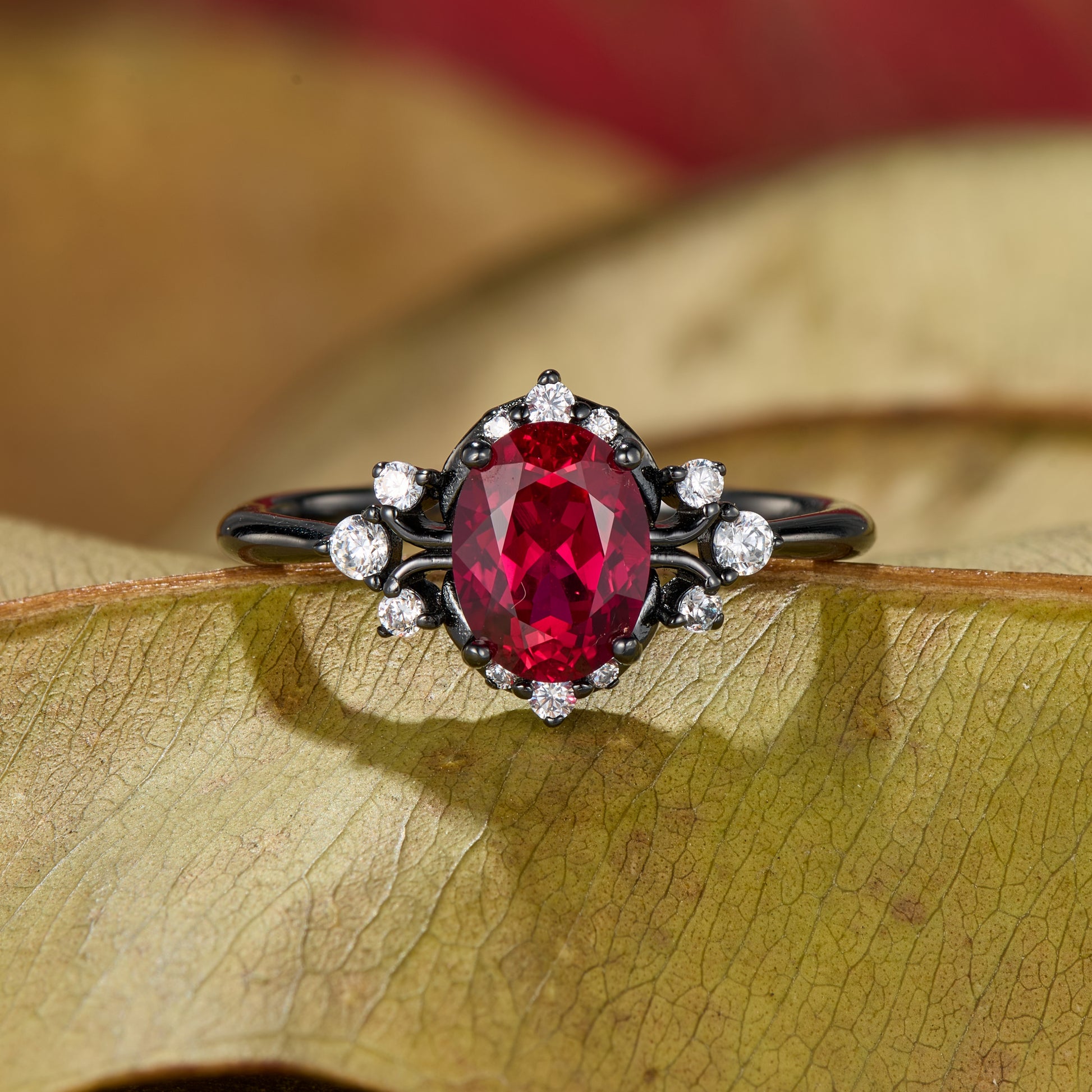 Valoria Oval Cut Lab Grown Ruby Ice-crackle Texture Black Gold Ring