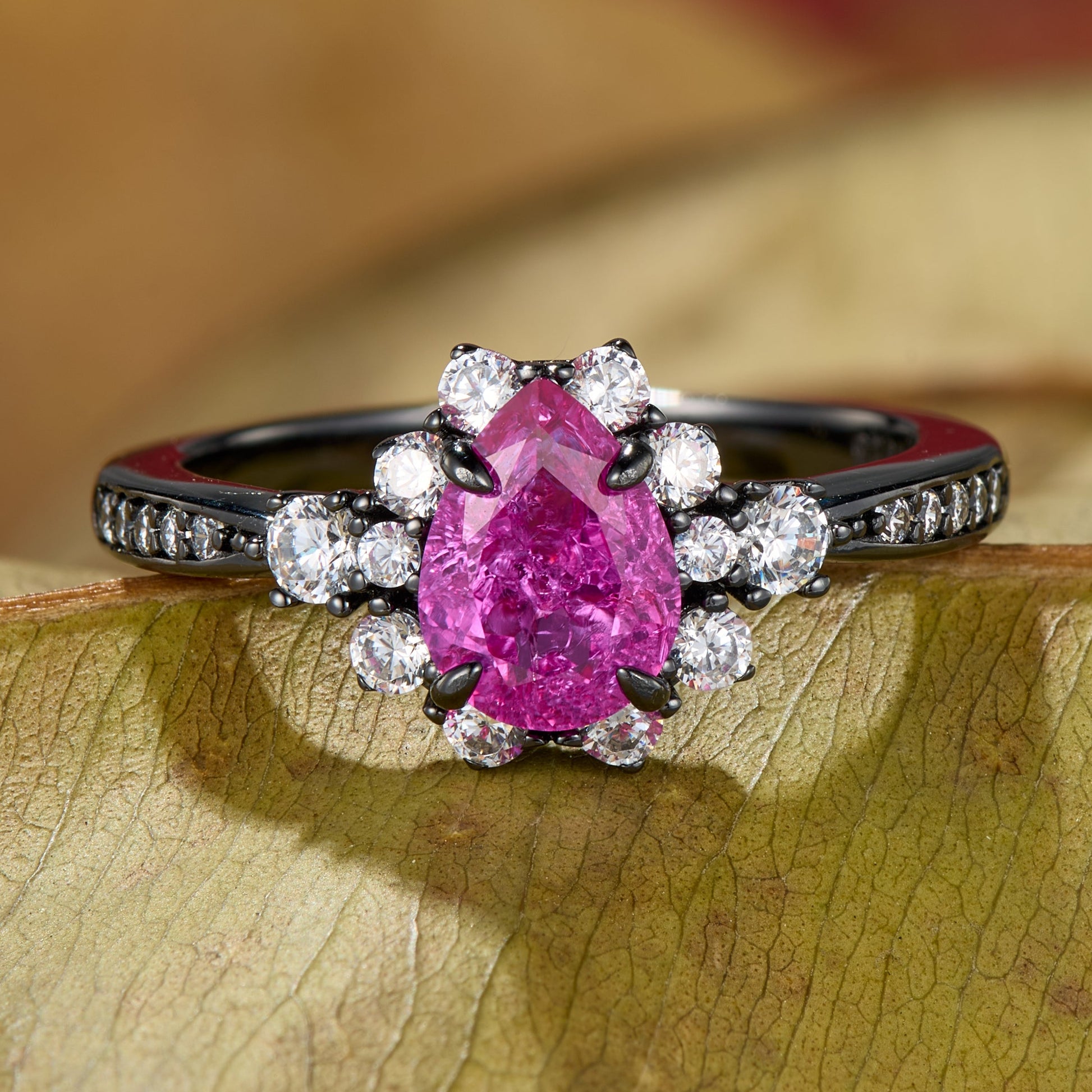 The Bethany Pear Cut Lab Grown Rose Sapphire Ice-crackle Texture Halo Black Gold Ring