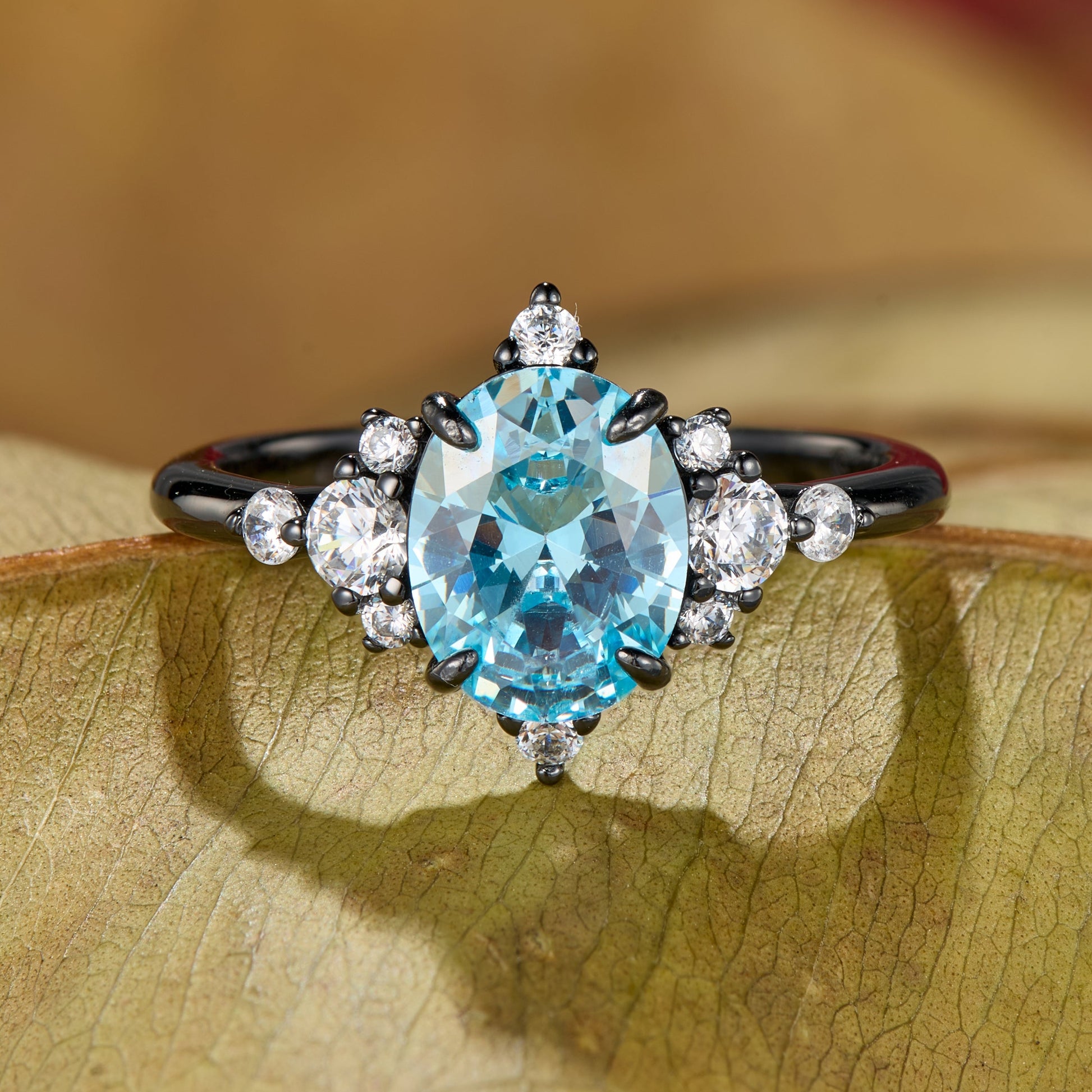 Carlotta Oval Cut Topaz Black Gold Engagement Ring