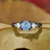 The Alina Round Cut Lab Grown Aquamarine Ice-crackle Texture Black Gold Ring