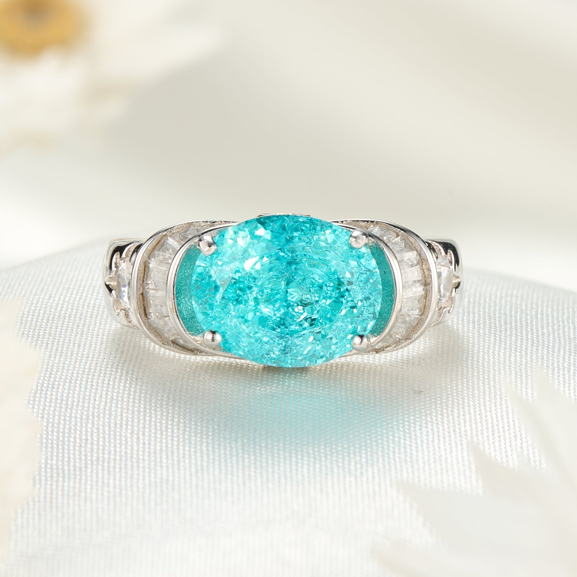 The Esmeralda Oval Cut Lab Grown Paraiba Ice-crackle Texture Ring