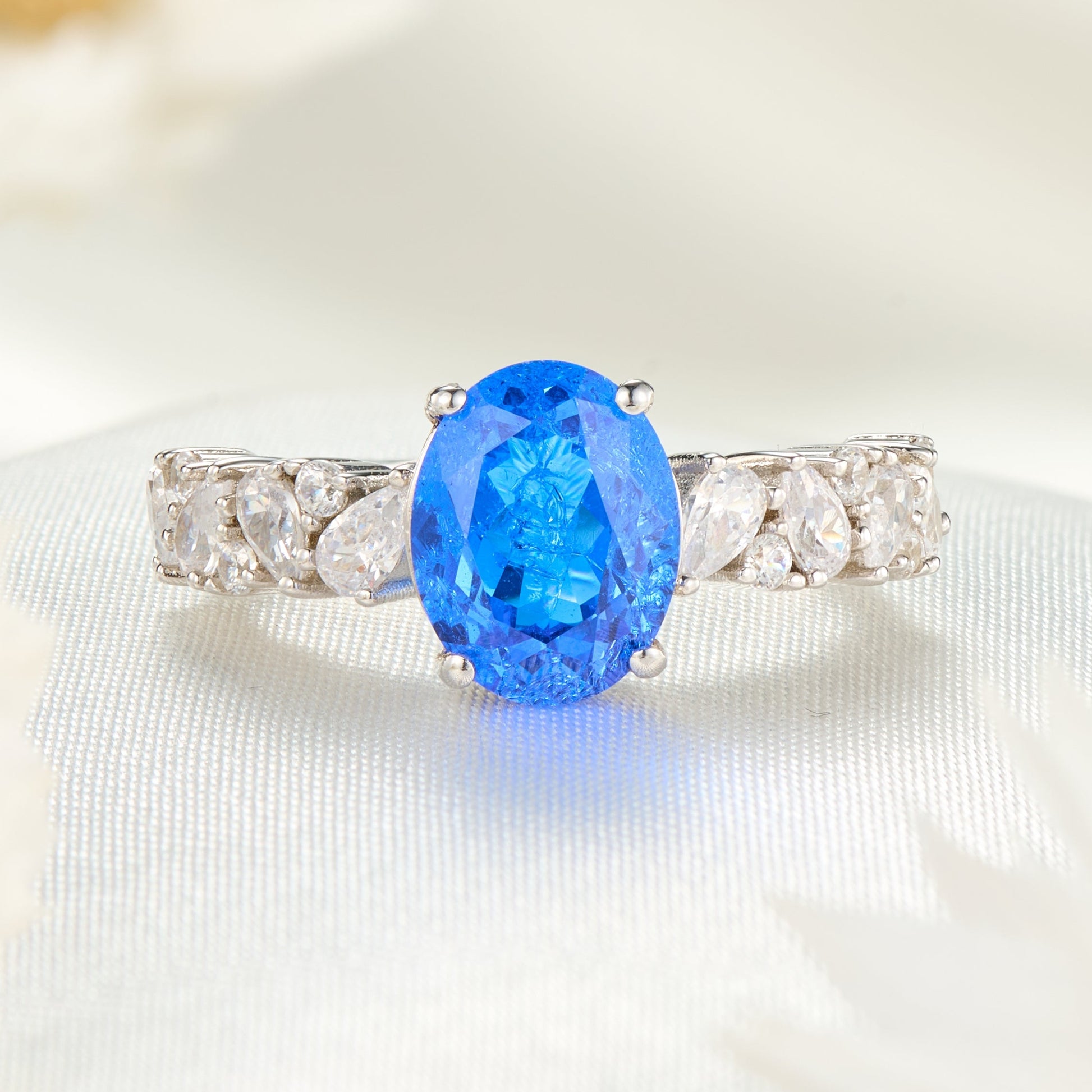 Celestine Oval Cut Lab Grown Blue Spinel Ice-crackle Texture Ring