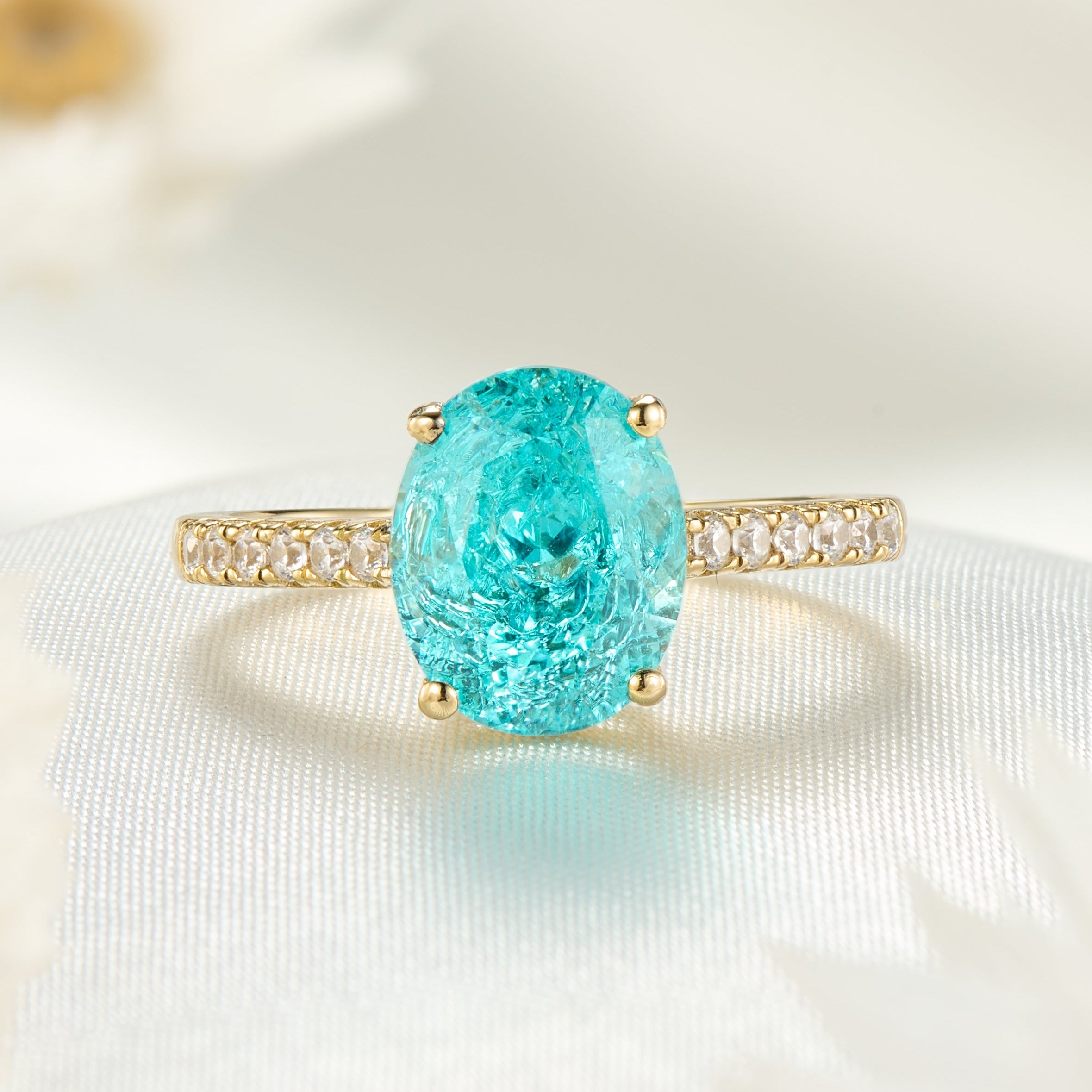 The Opaline Oval Cut Lab Grown Paraiba Ice-crackle Texture Ring