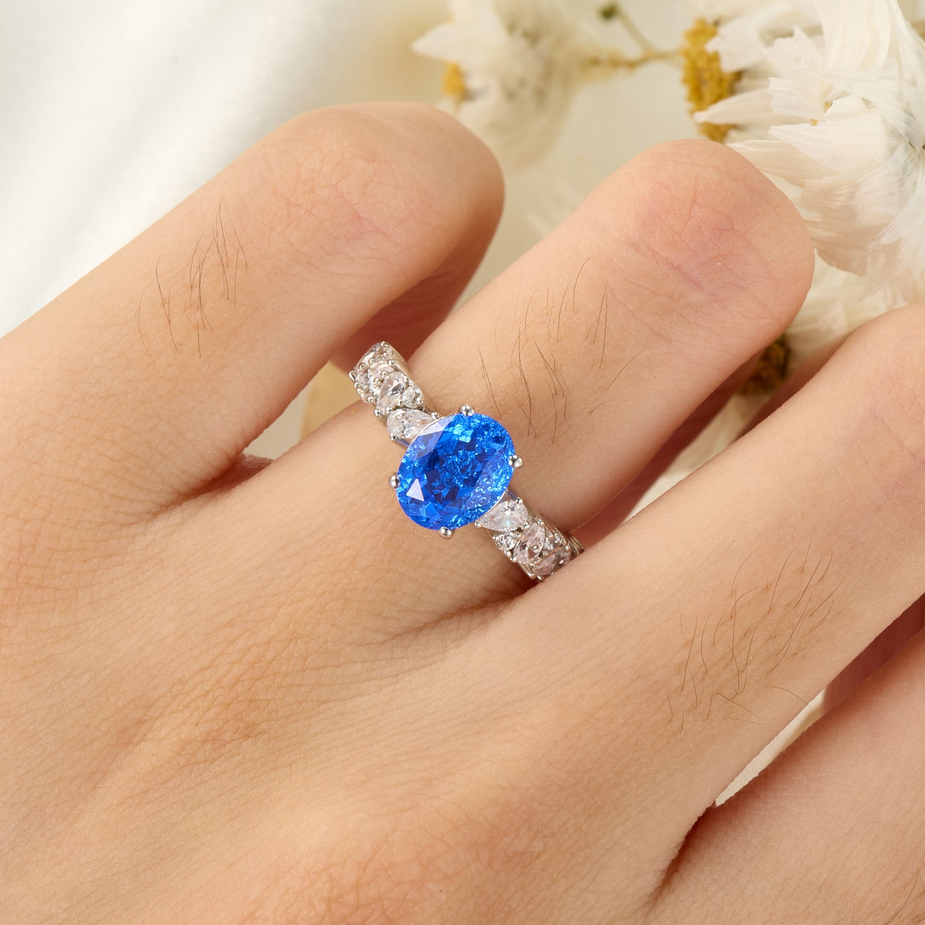 The Celestine Oval Cut Lab Grown Blue Spinel Ice-crackle Texture Ring
