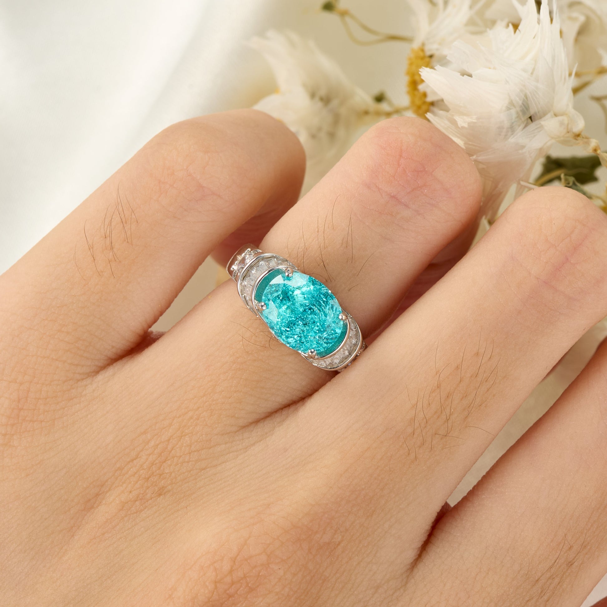 The Esmeralda Oval Cut Lab Grown Paraiba Ice-crackle Texture Ring