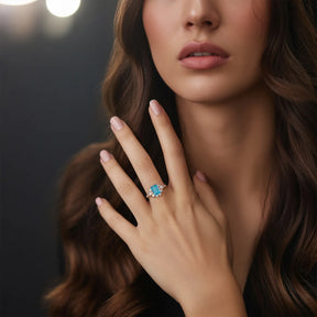 The Bethany 2CT Emerald Cut Blue Moissanite Halo Ring