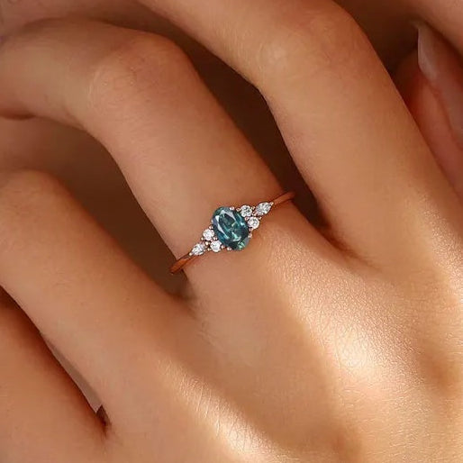 Nature Inspired Oval Cut Green Gemstone Cluster Engagement Ring