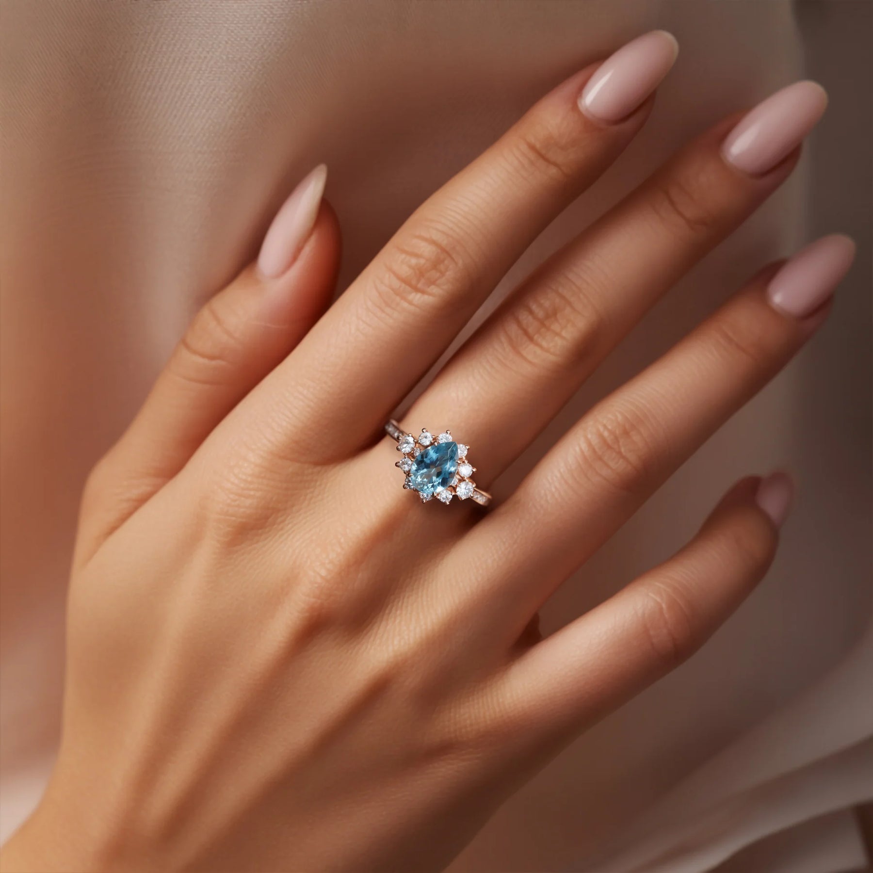 The Bethany Pear Cut Blue Moissanite Halo Ring
