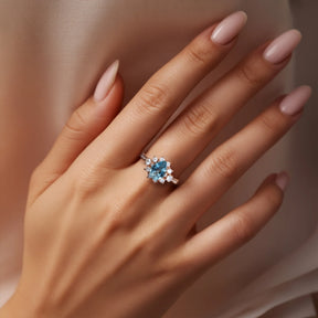 The Bethany Pear Cut Blue Moissanite Halo Ring