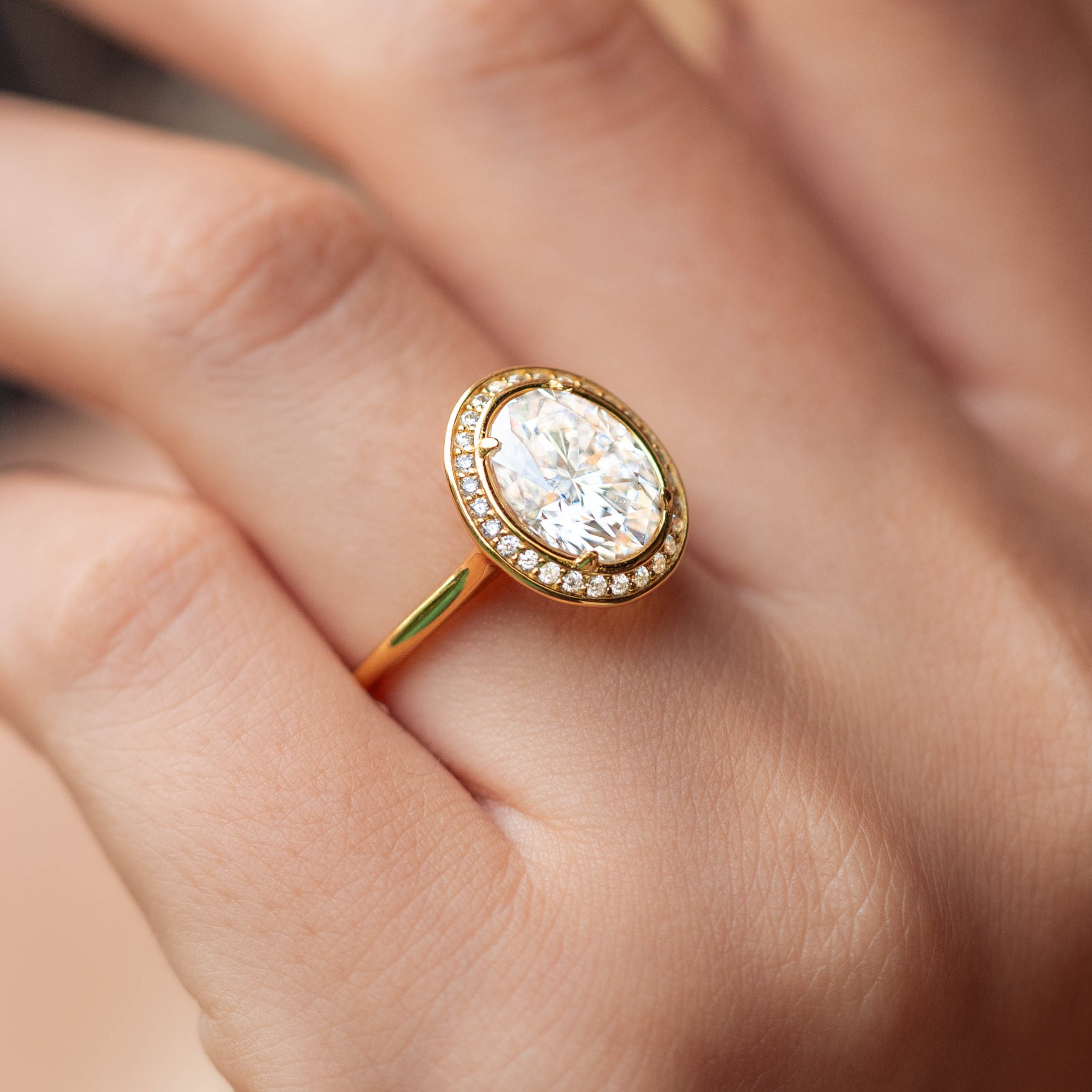 The Elizabeth Oval Cut Halo Moissanite Ring