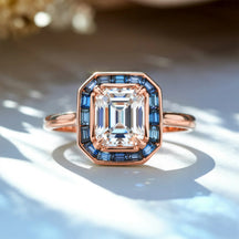 The Indigo Whisper 1CT Emerald Cut Halo Moissanite Ring