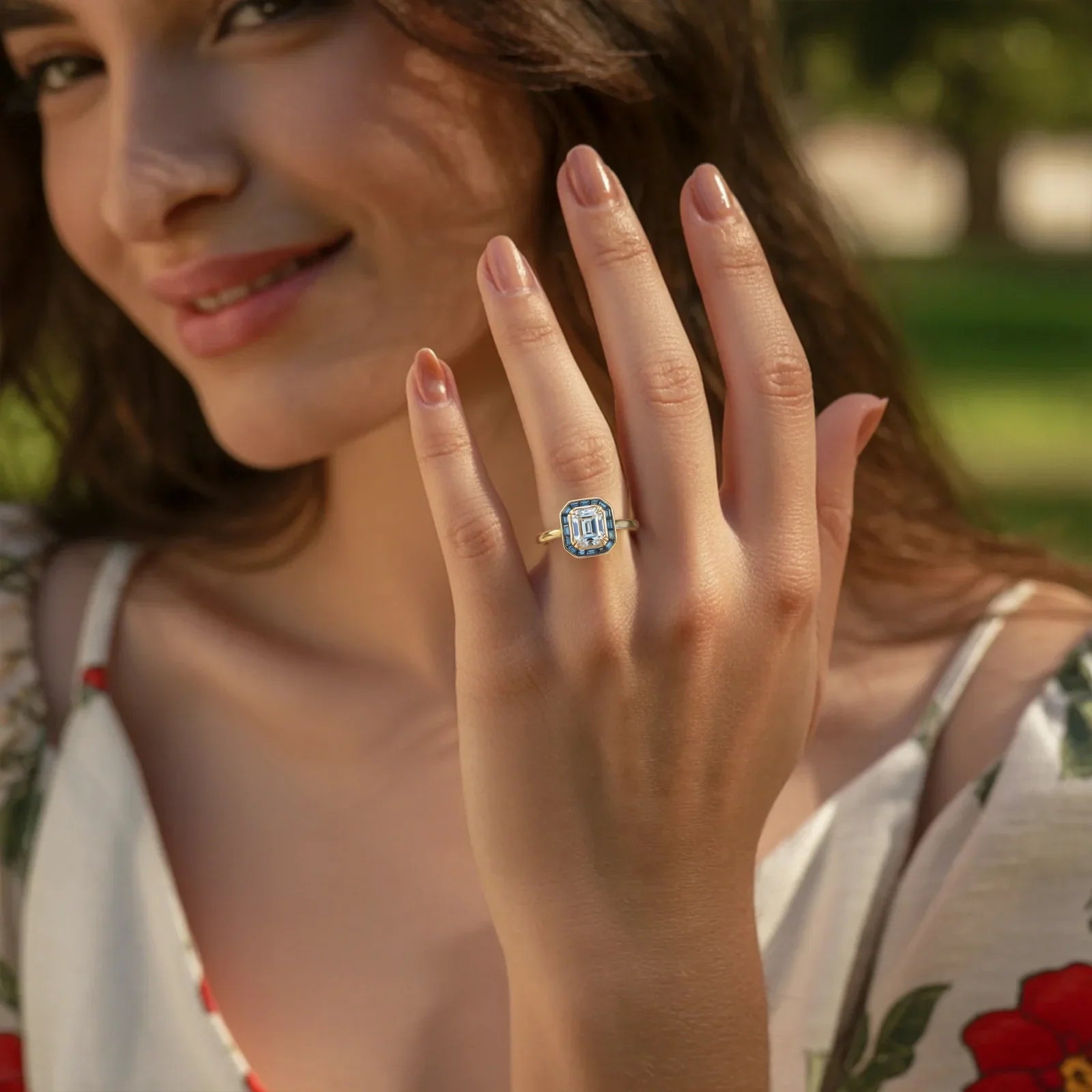 The Indigo Whisper Emerald Cut Halo Moissanite Ring