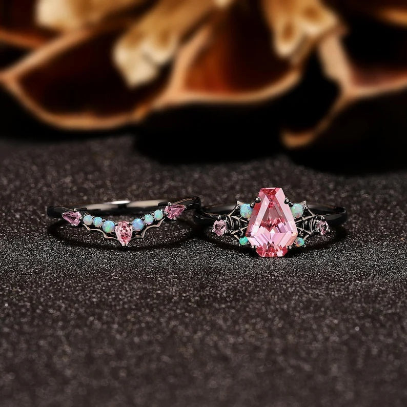 Virelia Vintage Ring mit smaragdgeschliffenem, verschlungenem Zweig und rosa Edelstein