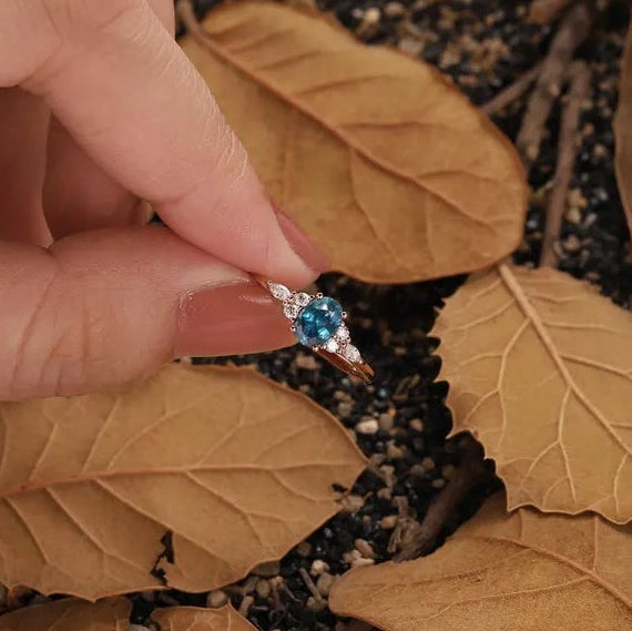 Nature Inspired Oval Cut Green Gemstone Cluster Engagement Ring