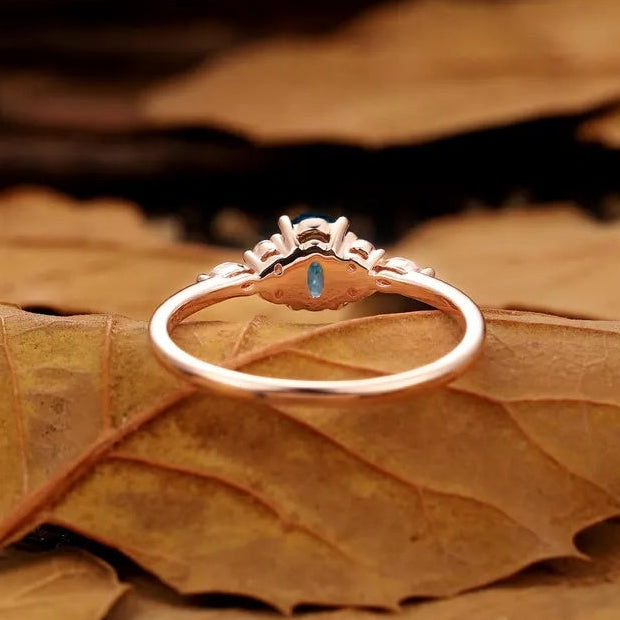 Nature Inspired Oval Cut Green Gemstone Cluster Engagement Ring