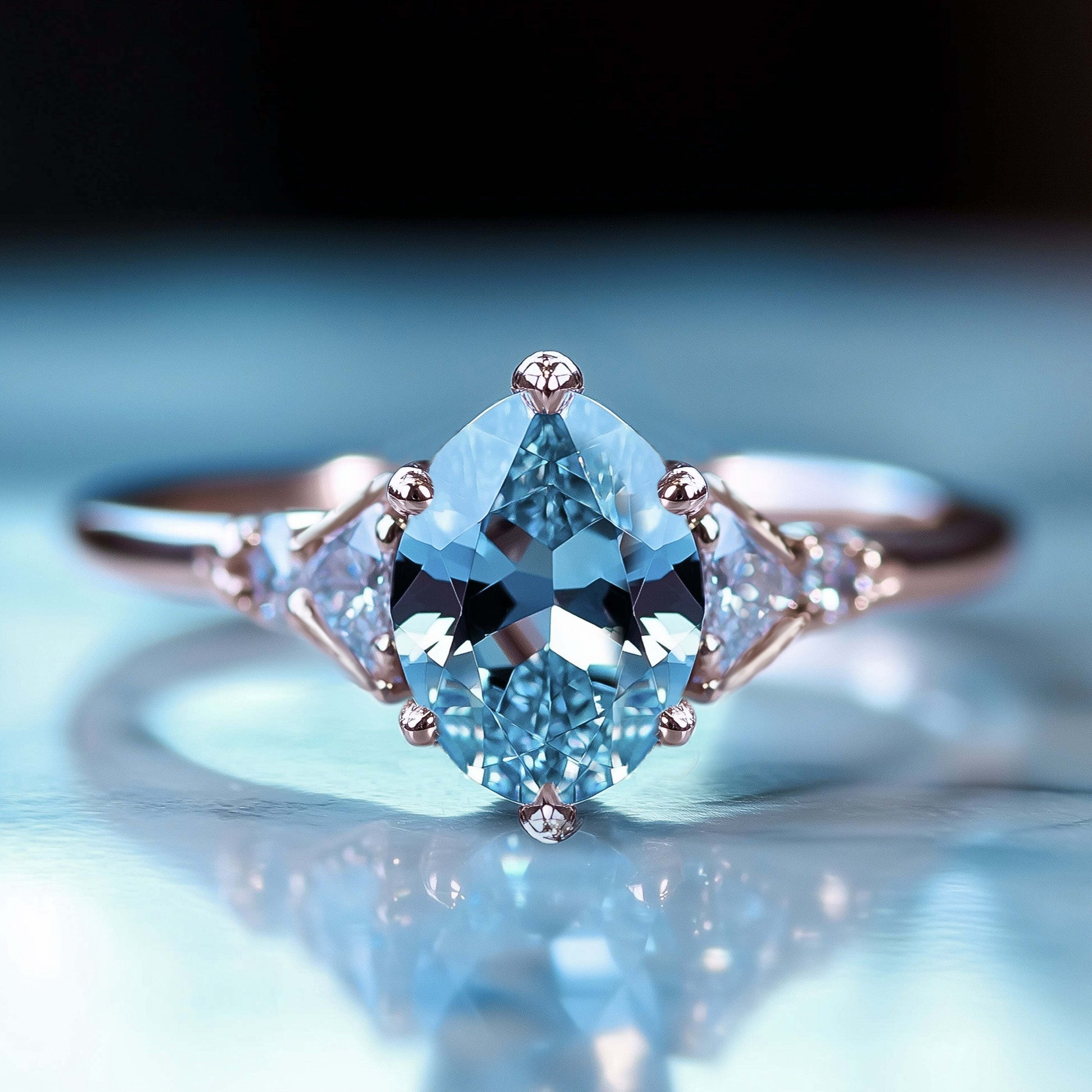Aurora Belle Ring mit ovalem, blauem Edelstein