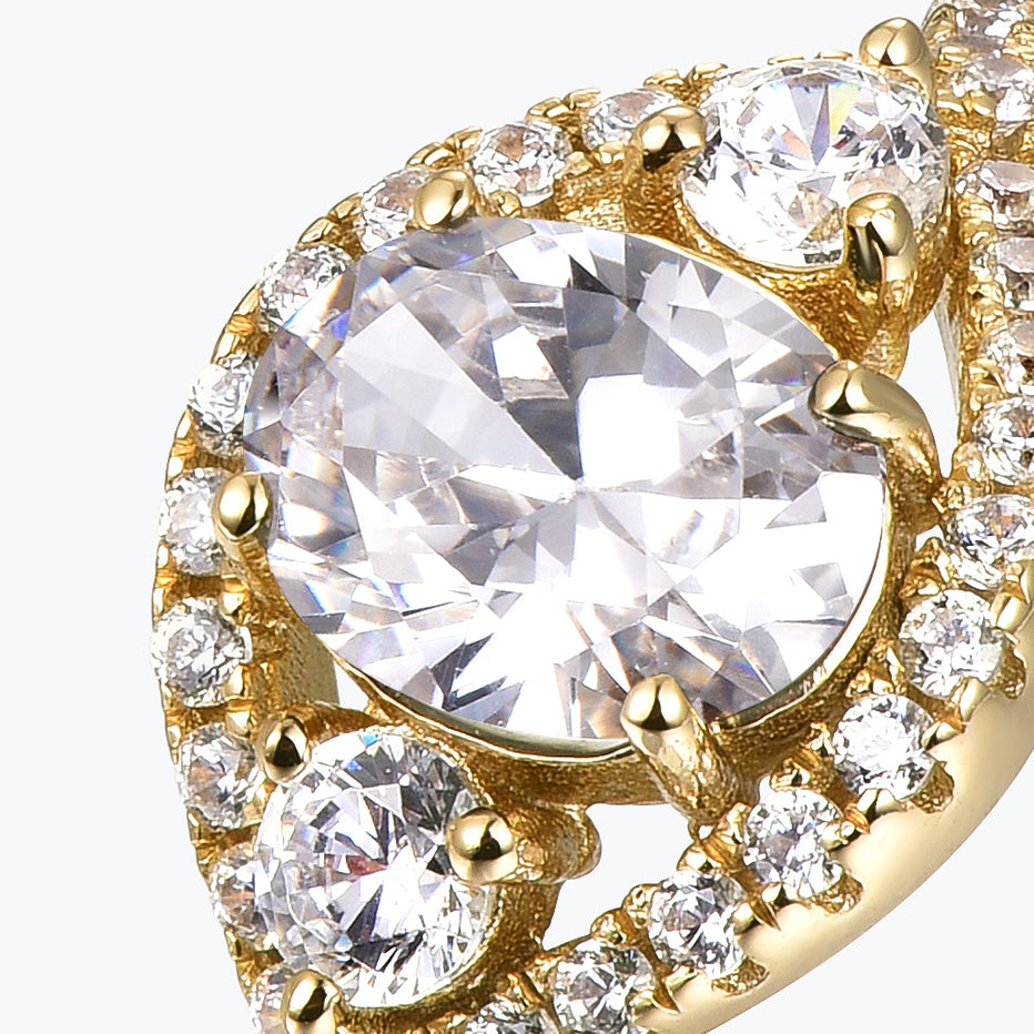 Bague de fiançailles Dissoo® en or ovale avec moissanite et anneau pavé torsadé.